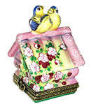 Limoges box birdhouse with birds on top and two chicks inside