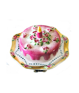 Limoges box pink birthday cake with candle on elegant plate