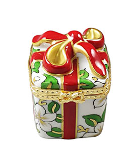Limoges box wrapped Christmas gift with poinsettia decor and red bow