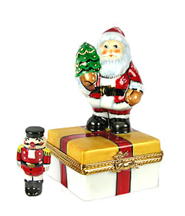 Rochard Santa on gift with nutcracker Limoges box