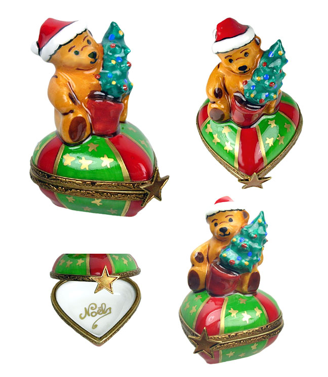 Christmas teddy in Santa cap holding tree on festive heart Limoges box