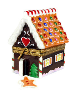 Limoges box gingerbread house with candy trim and gingerbread man