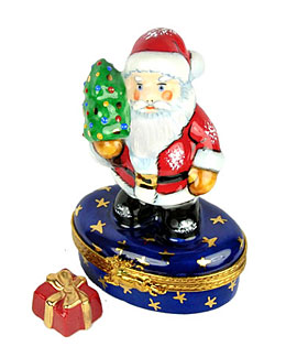 Santa with tree Limoges box on gold stars base