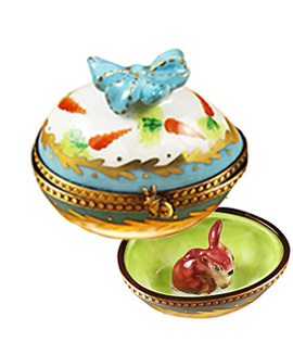 Limoges box blue and white egg with hiding bunny
