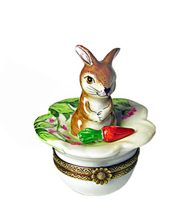 Limoges box bunny on flower with carrot
