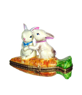 Limoges box rabbits kissing on carrot