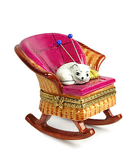 Limoges box cat in rocking chair with yarn and knitting needles